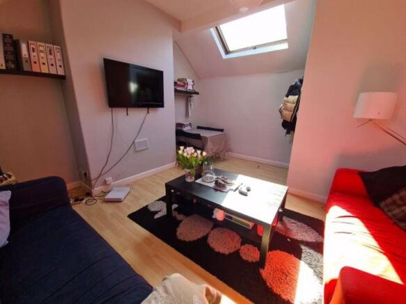 A bright and inviting living room featuring mod...