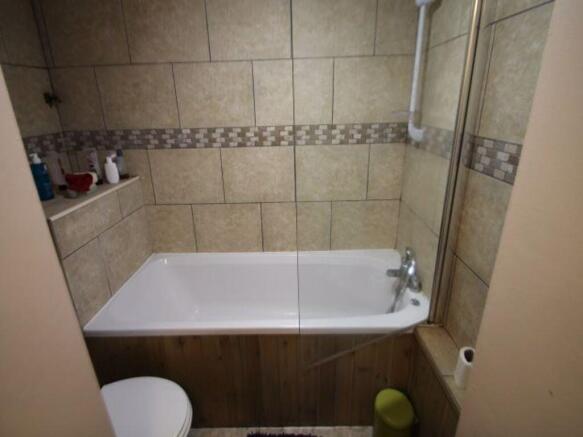 A clean, well-maintained bathroom with a spacio...