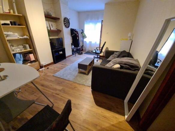 Bright and welcoming living room featuring cont...