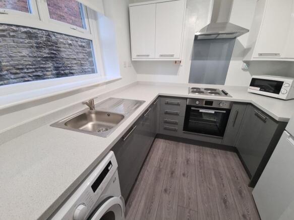 A modern, well-maintained kitchen with ample co...