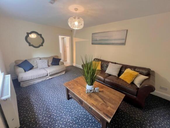 A spacious and inviting living room perfect for...