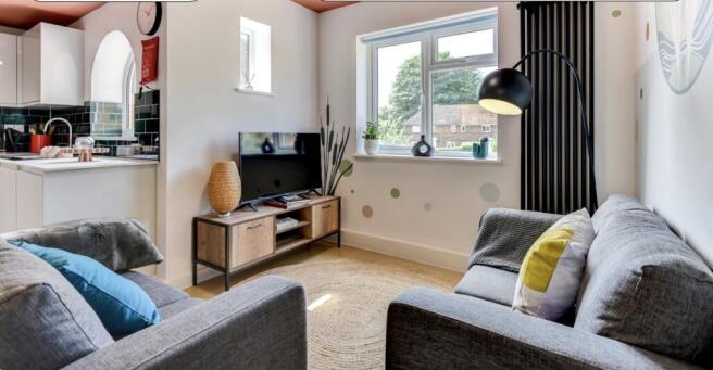 Bright and inviting living room featuring moder...