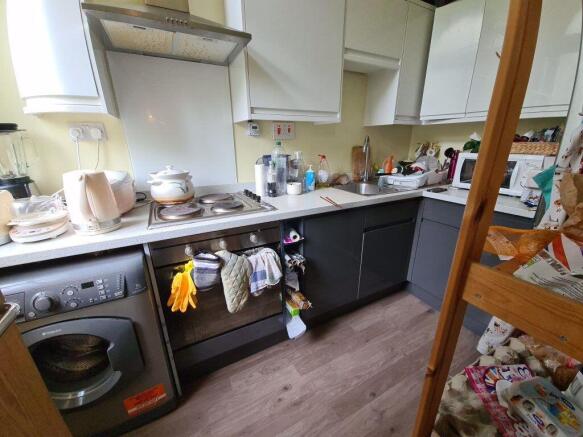 Bright and functional kitchen featuring modern ...