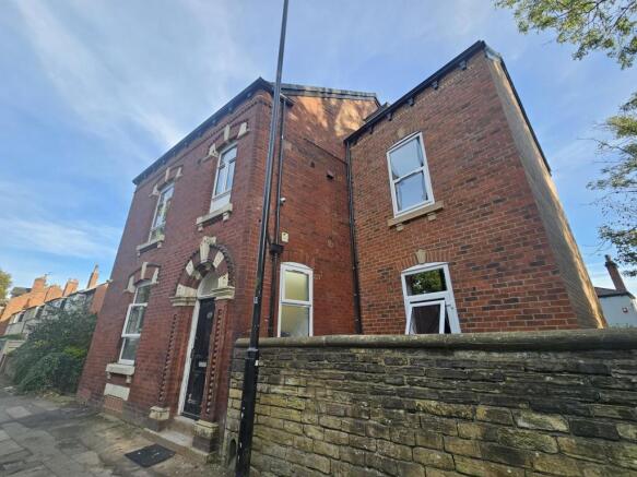 Attractive red-brick terraced house with decora...