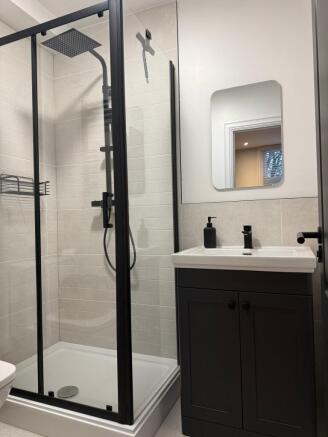 A modern and clean bathroom featuring a sleek b...