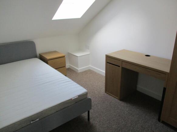 Bright and modern double bedroom with clear nat...