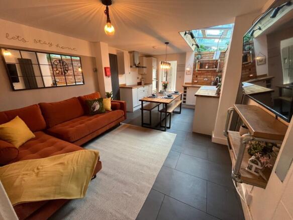 An inviting and stylish living area featuring a...