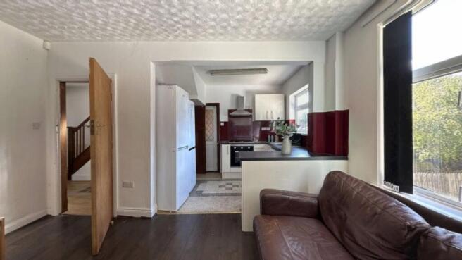 A bright and inviting living room with large wi...