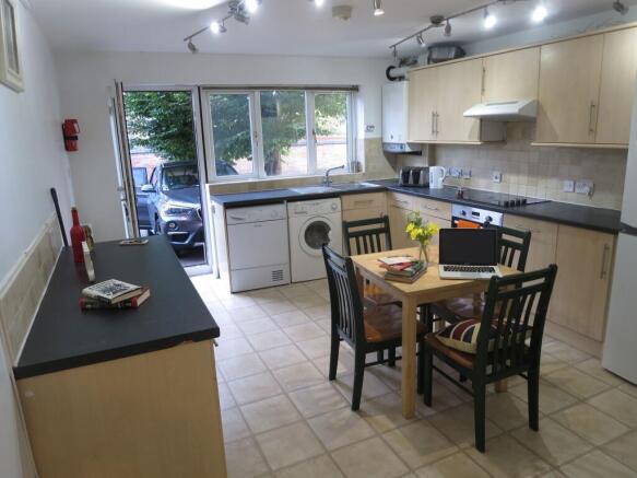 Bright and spacious kitchen with large windows ...