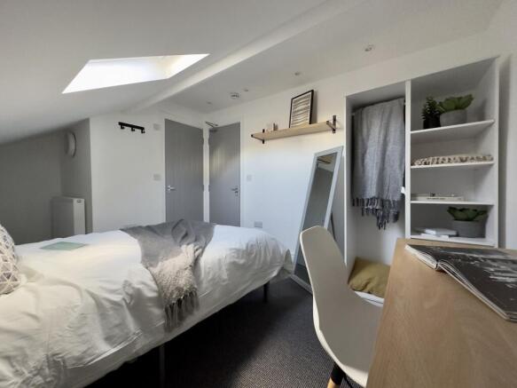 A spacious and inviting large double bedroom wi...