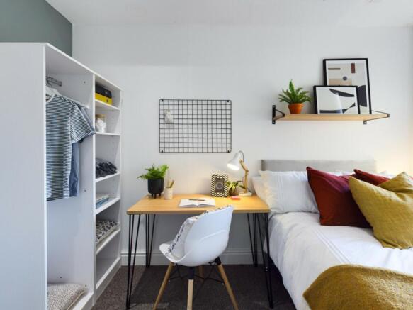 A stylish and inviting double bedroom featuring...