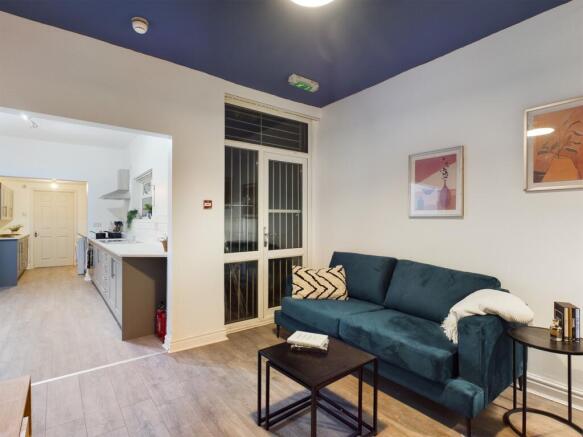 A spacious and stylish modern living room perfe...