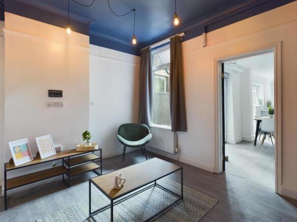 A bright and inviting living room with modern d...