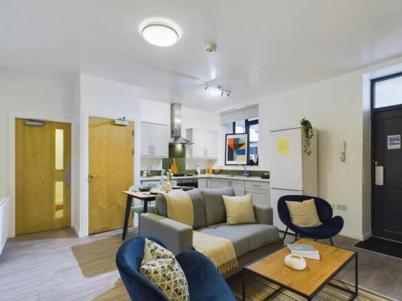 A bright and spacious modern living room, perfe...