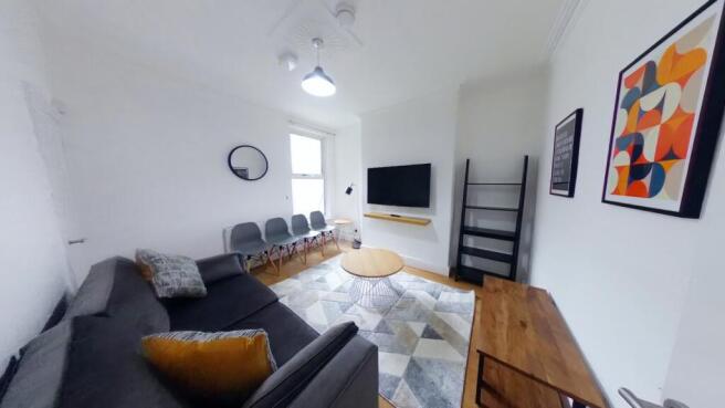 A spacious and inviting large modern living roo...