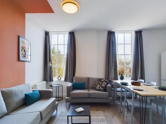 A spacious and bright modern living room, perfe...