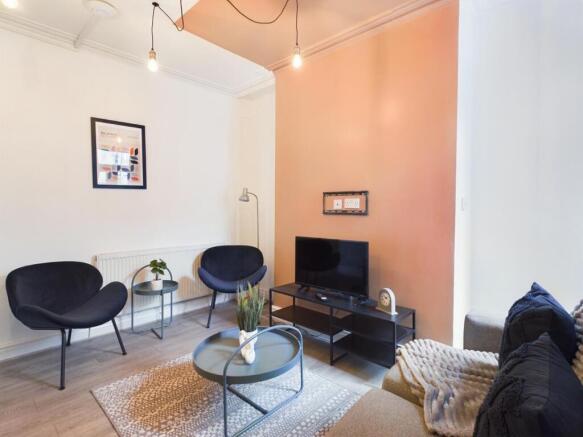 A stylish and inviting modern living room perfe...