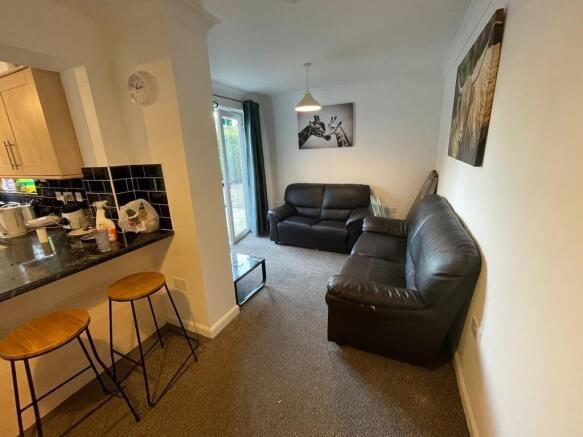 A modern and inviting living room featuring a c...