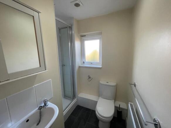 A clean and well-maintained bathroom featuring ...