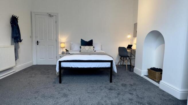 A spacious and stylish large double bedroom, pe...