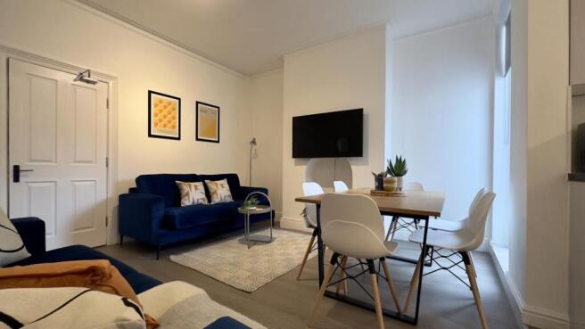 A spacious and inviting modern living room perf...