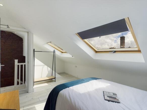 A spacious and bright large double bedroom with...