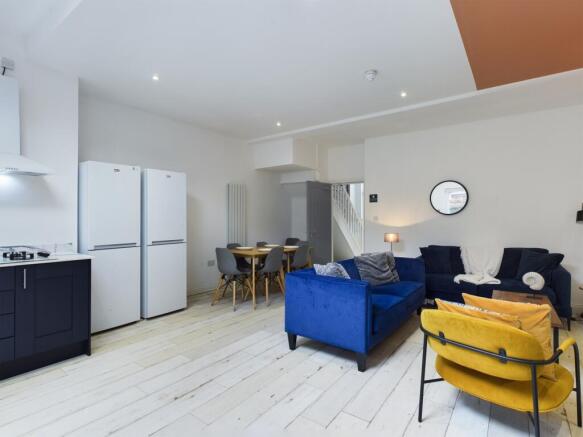 A spacious and stylish modern living room perfe...