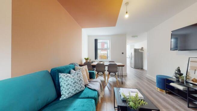 A spacious and stylish modern living room, perf...