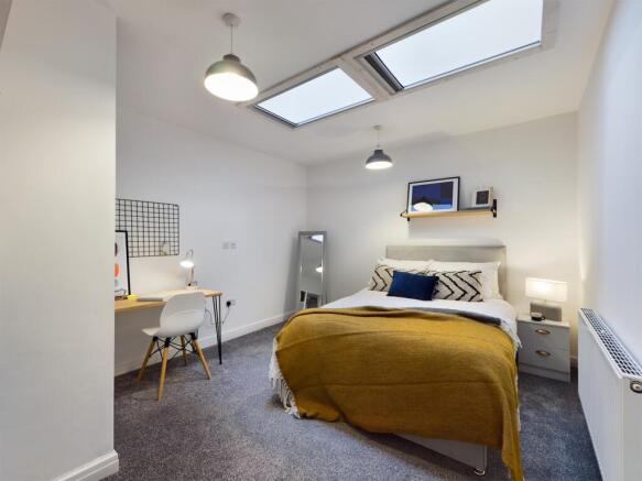 A spacious and bright large double bedroom feat...