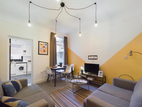 A stylish and spacious modern living room with ...