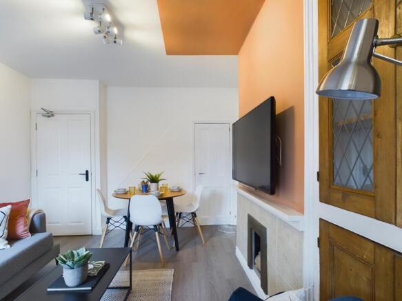 A bright and stylish large modern living room p...