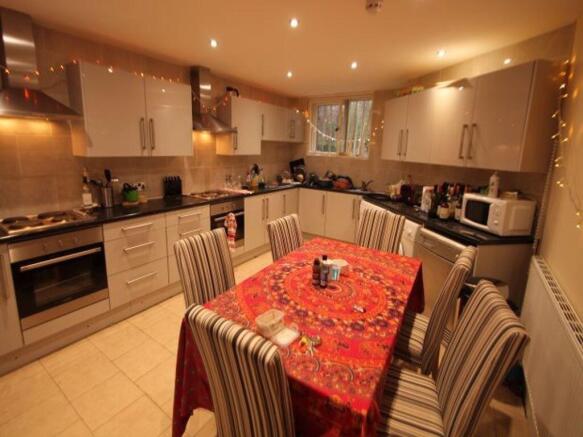 A modern kitchen featuring ample cabinetry, int...