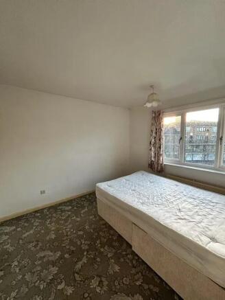 A double bedroom featuring a comfortable double...