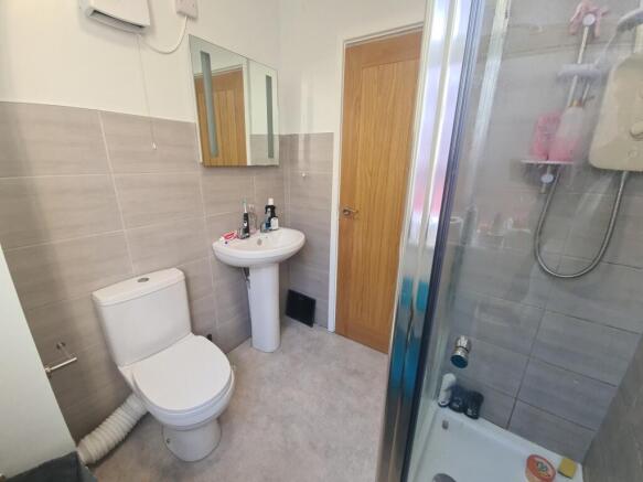 A modern and well-maintained bathroom featuring...