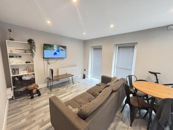 A bright and airy living room featuring modern ...