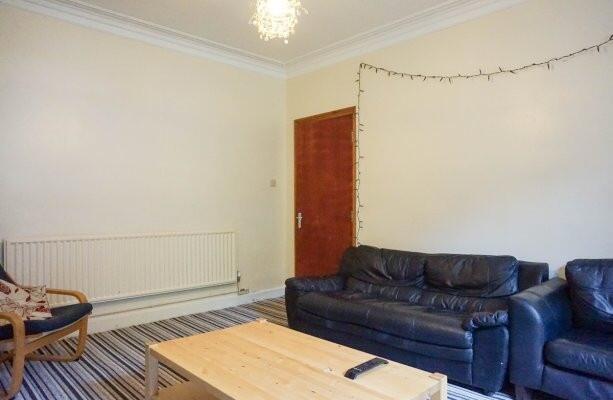 A cozy and inviting living room with comfortabl...