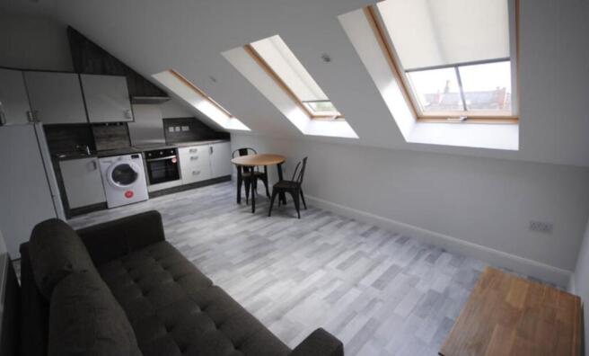 Bright and spacious contemporary living room wi...