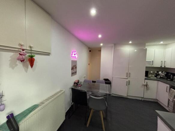 A modern and cozy living room featuring comfort...