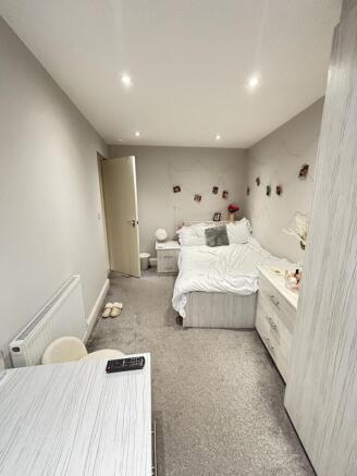 A spacious and well-maintained master bedroom f...