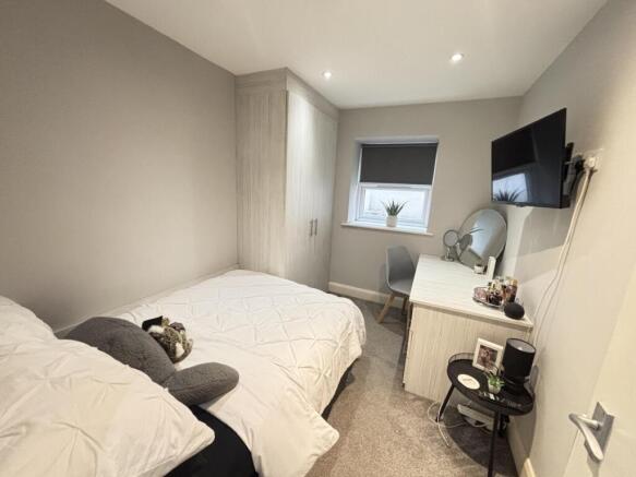 A well-presented double bedroom with neutral de...
