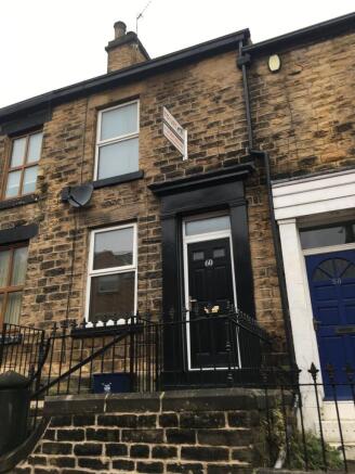 Attractive stone-fronted terraced property with...