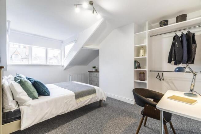 Bright, well-presented bedroom with a comfortab...