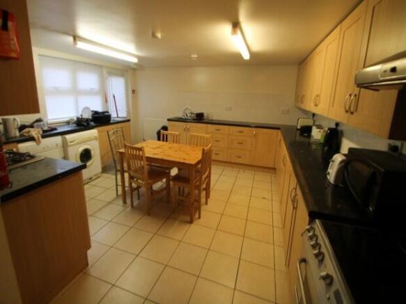 Spacious, well-equipped communal kitchen with a...