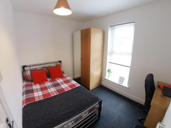 Bright, neatly presented double bedroom with a ...