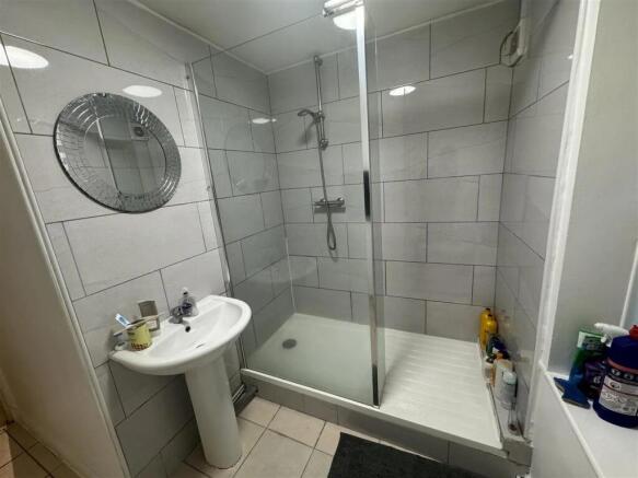 A clean and well-maintained bathroom featuring ...