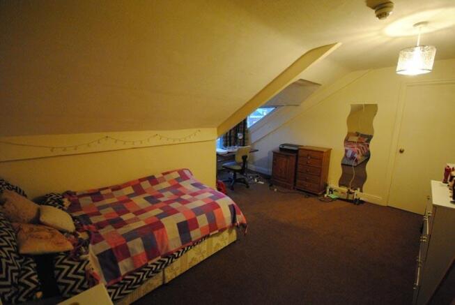 Spacious master bedroom featuring a double bed ...