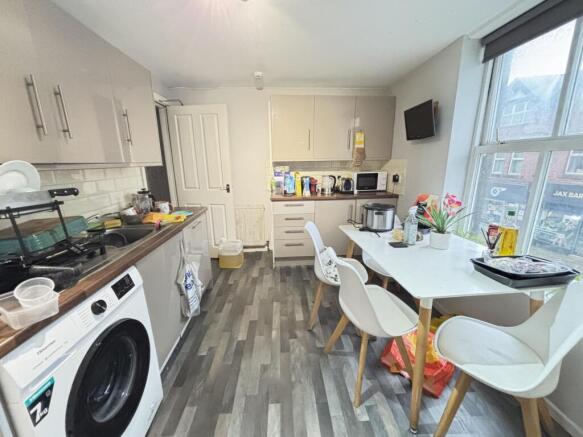 Bright and modern living room with ample natura...