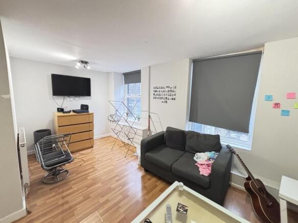 Bright and spacious living room with modern fur...