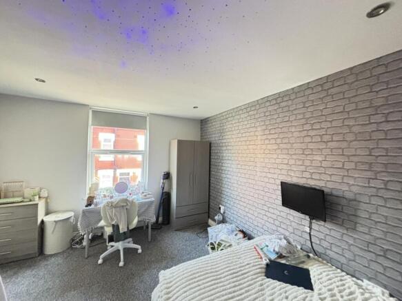 Bright and welcoming living room with natural l...