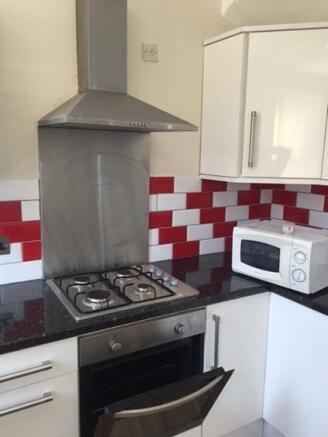 A modern kitchen area featuring a stainless ste...
